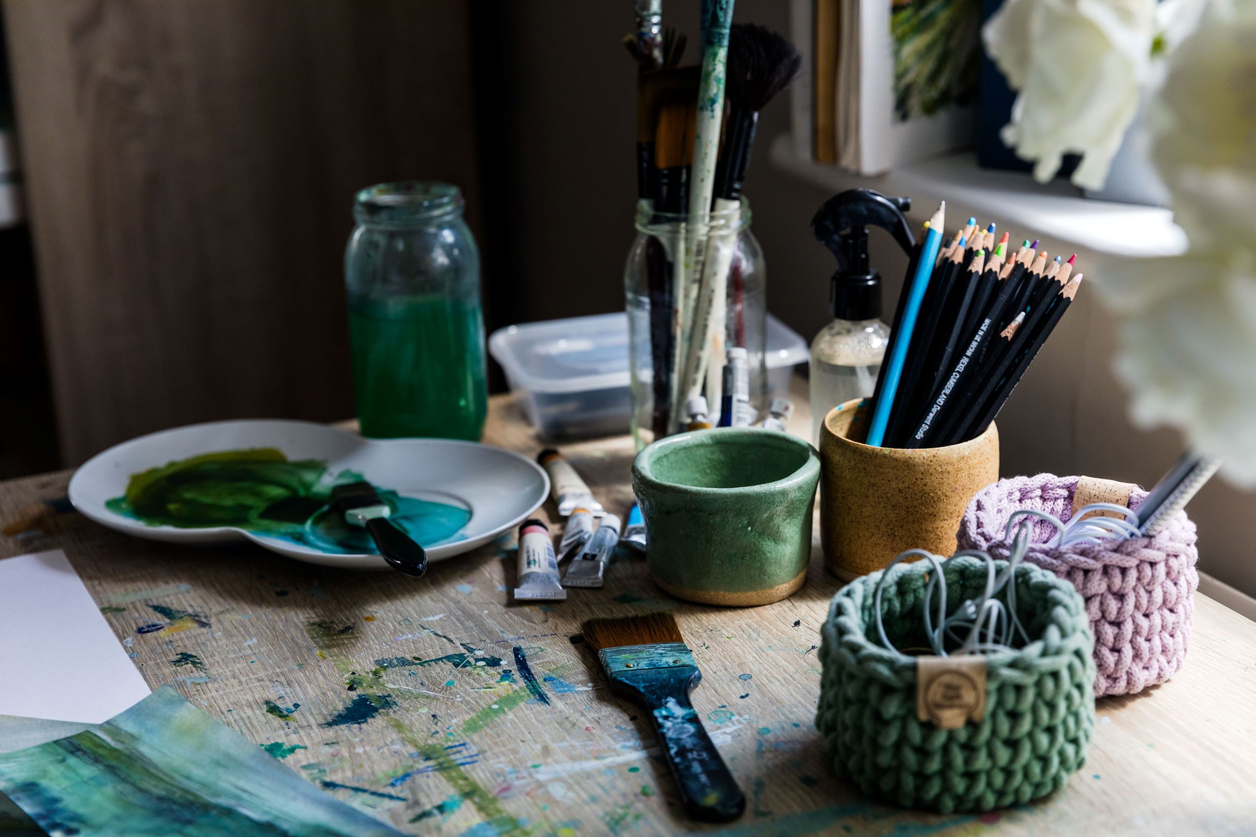 Charlotte Riley, British Contemporary Artist. Landscape image of painting table & equipment